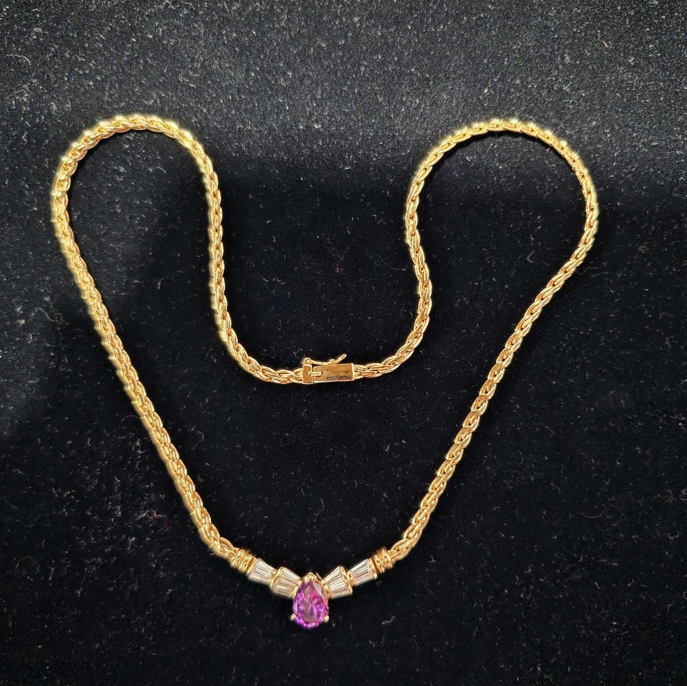 Elegant Gold Necklace with Purple Gemstone